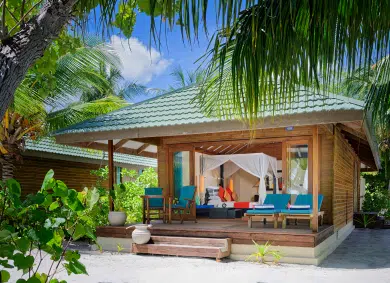 Exterior of a beach villa at Canareef Resort Maldives