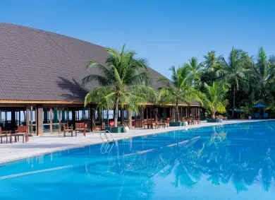 Dhoni bar with the swimming pool at Canareef Resort Maldives