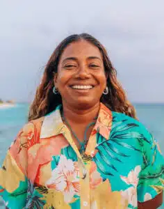 A woman smiling at the camera at Canareef Resort Maldives
