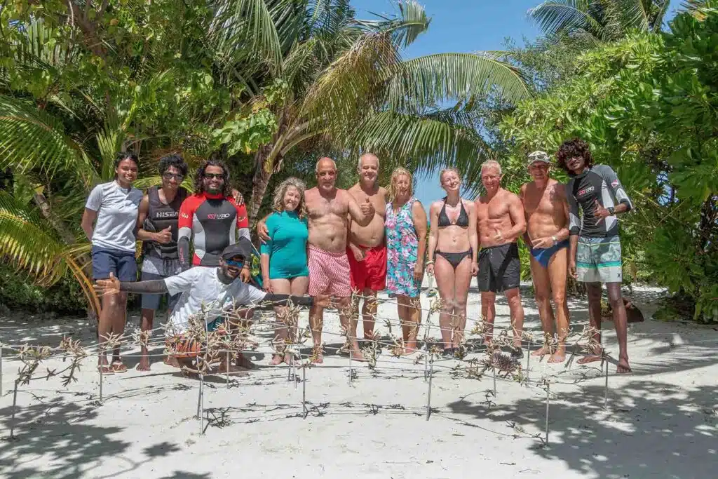Guests helping with coral transplanting at Canareef Resort Maldives
