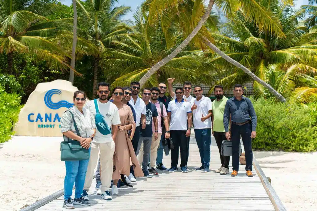 Guests at the entrance of Canareef Resort Maldives