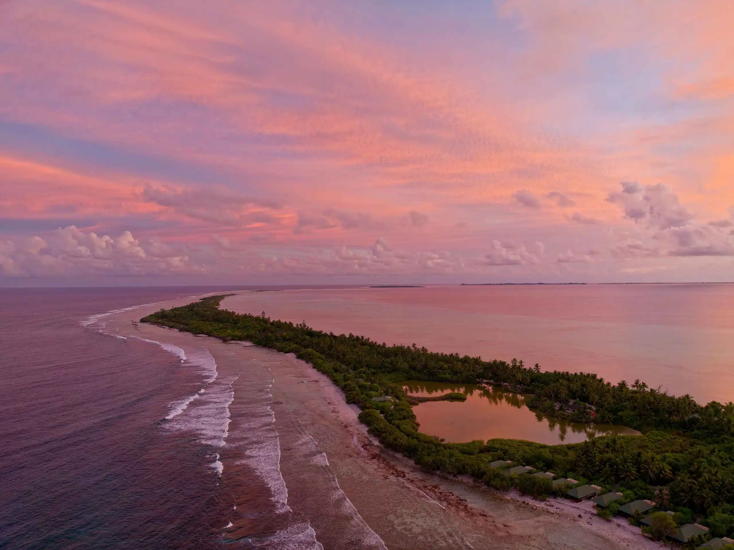 Aerial view of Canareef Eco Park during sunset